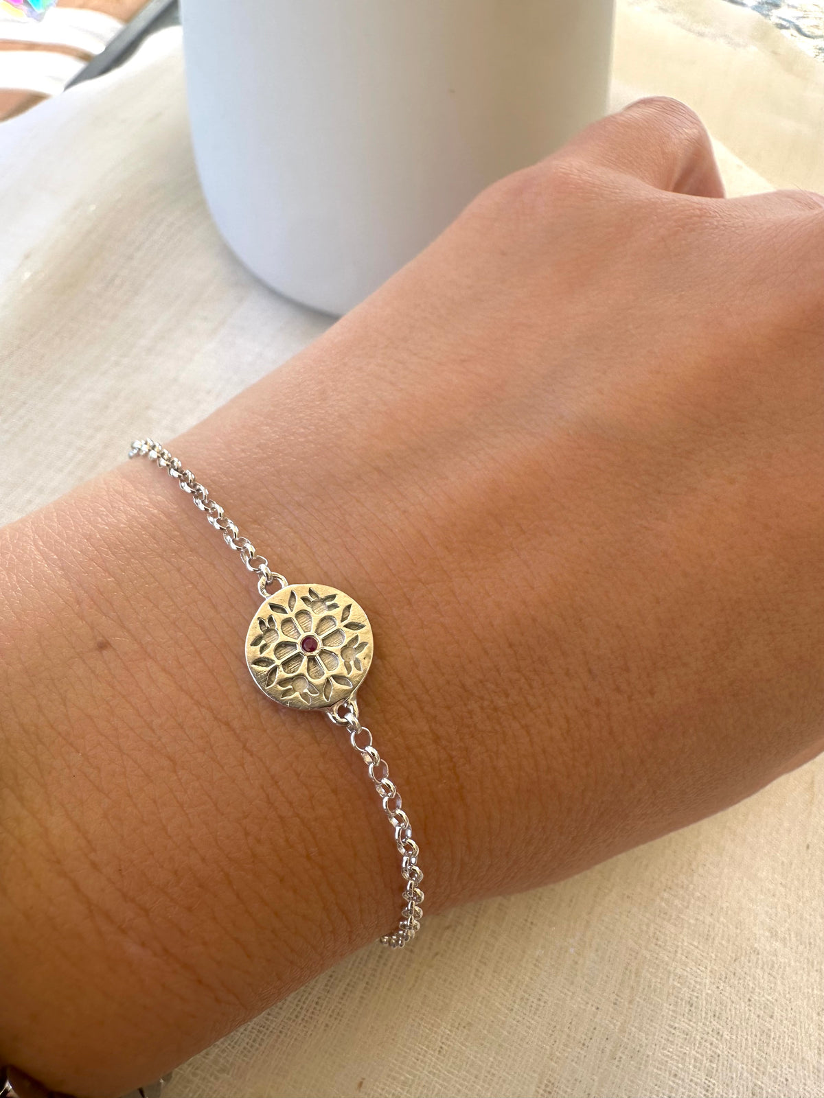 Tatreez bracelet with a 10 to 11mm center charm