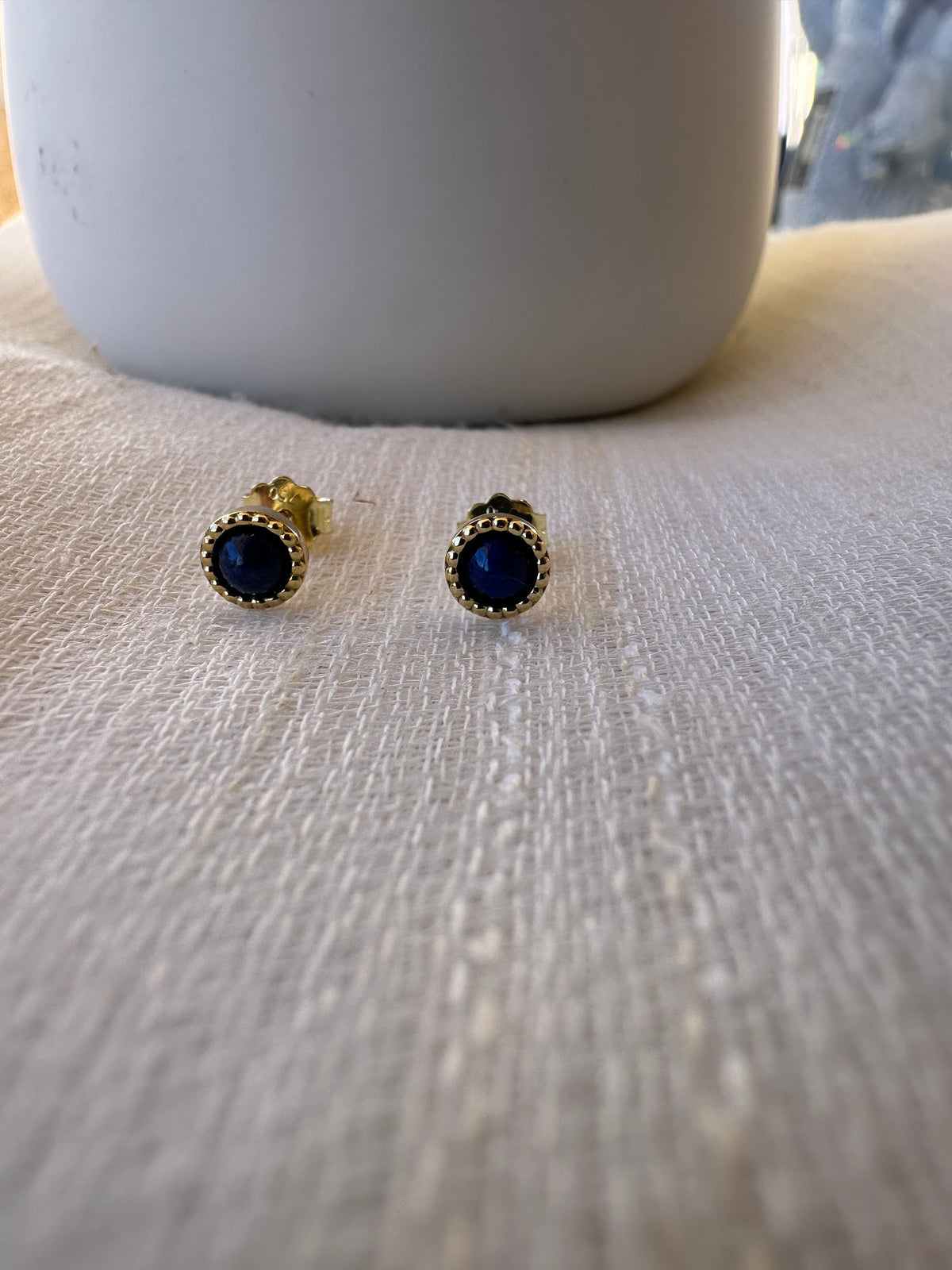 Lapis lazuli earrings with a thick gold bezel setting
