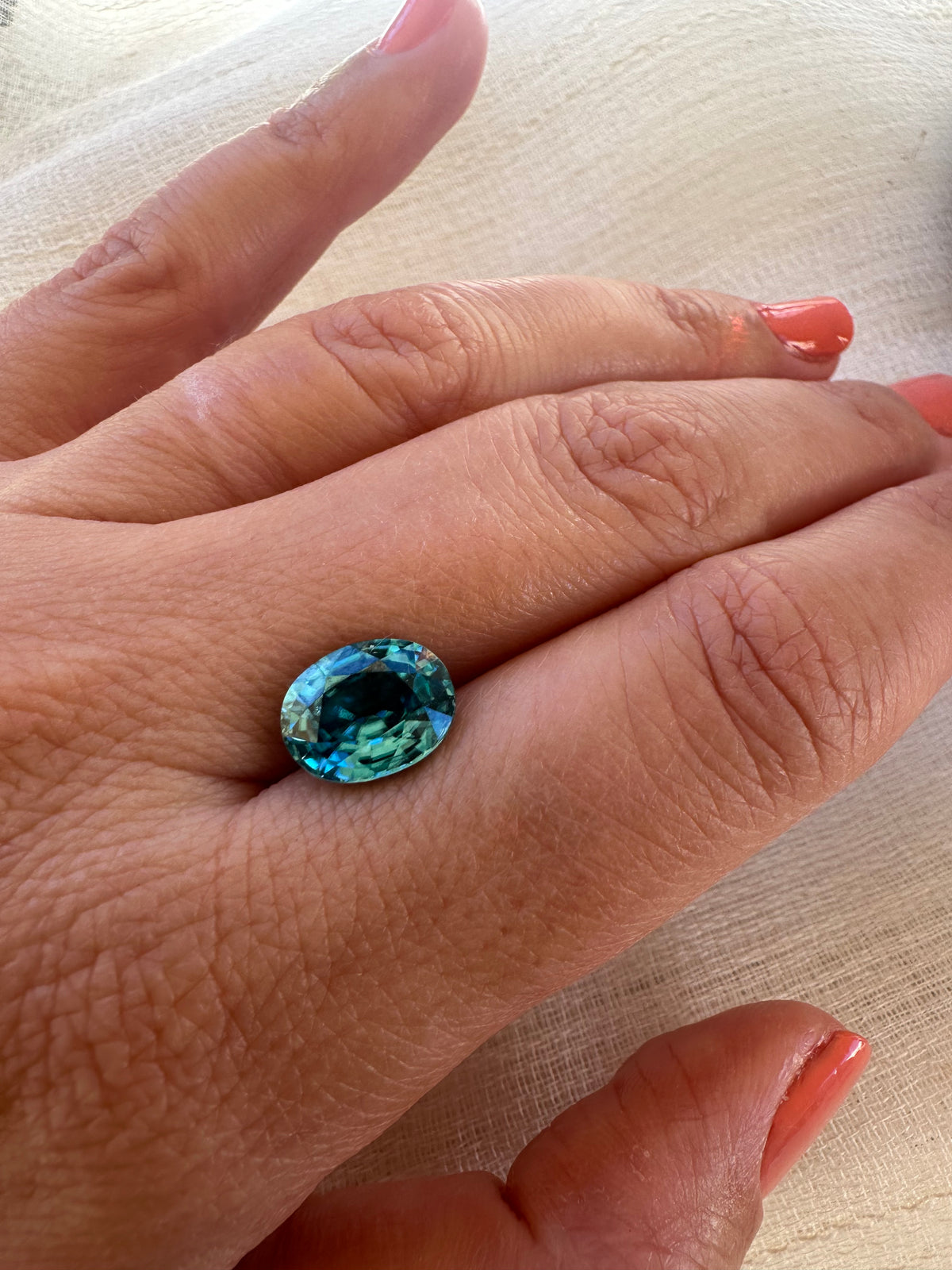 Natural blue zircon gemstone, 4.99 carats, 10.8 x 8.4mm dimensions