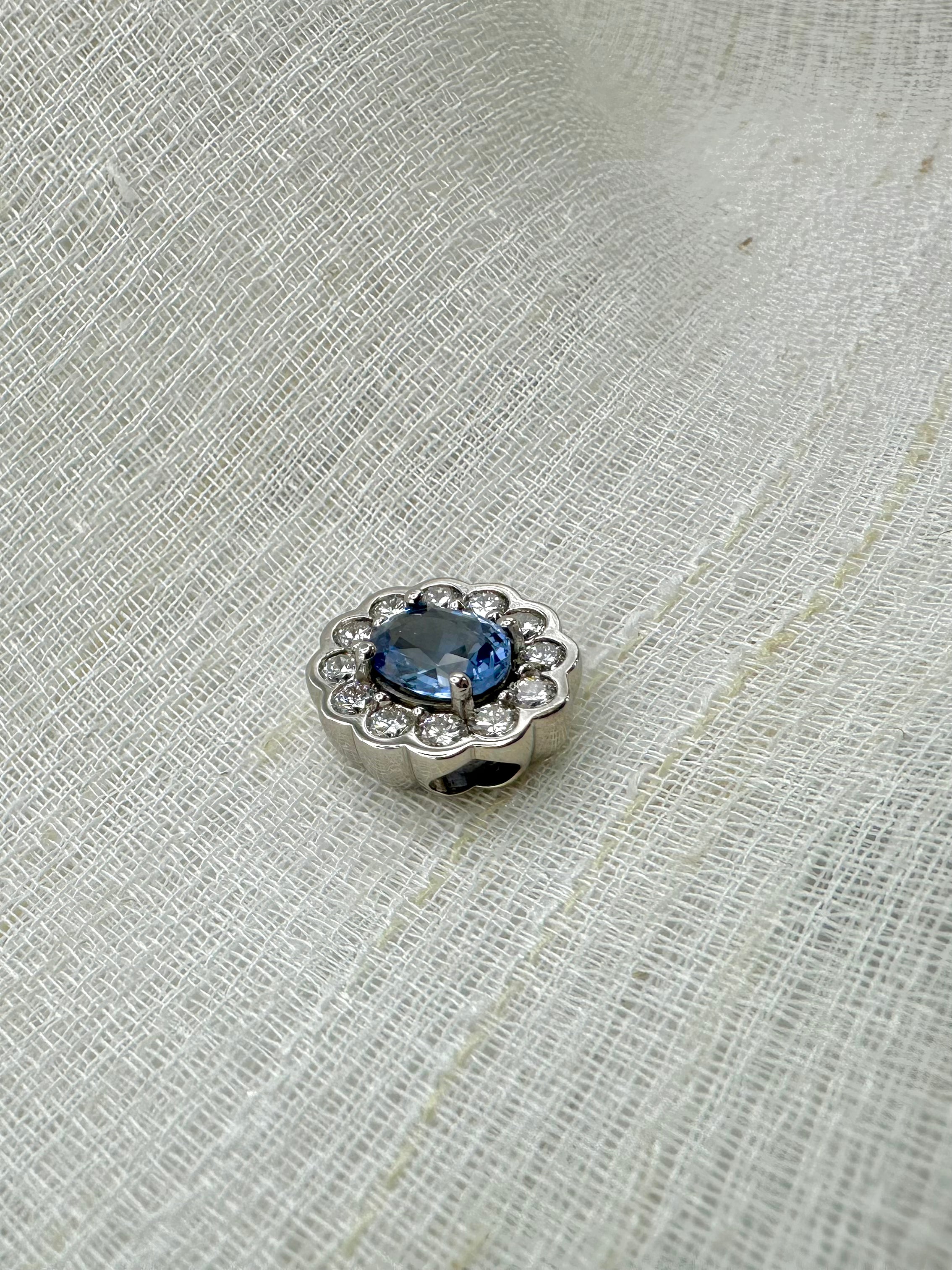 Sapphire halo pendant in 14K white gold with a 1.54ct sapphire, second view