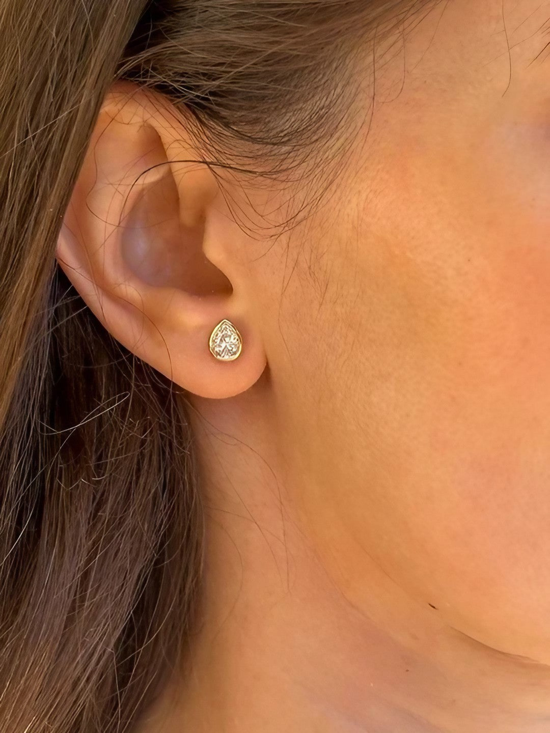 Pear moissanite stud earrings, a stone second in hardness only to diamond