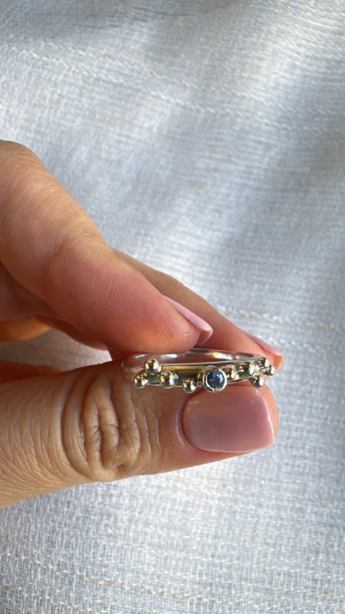 Organic silver ring made from D shape wire with soldered granules
