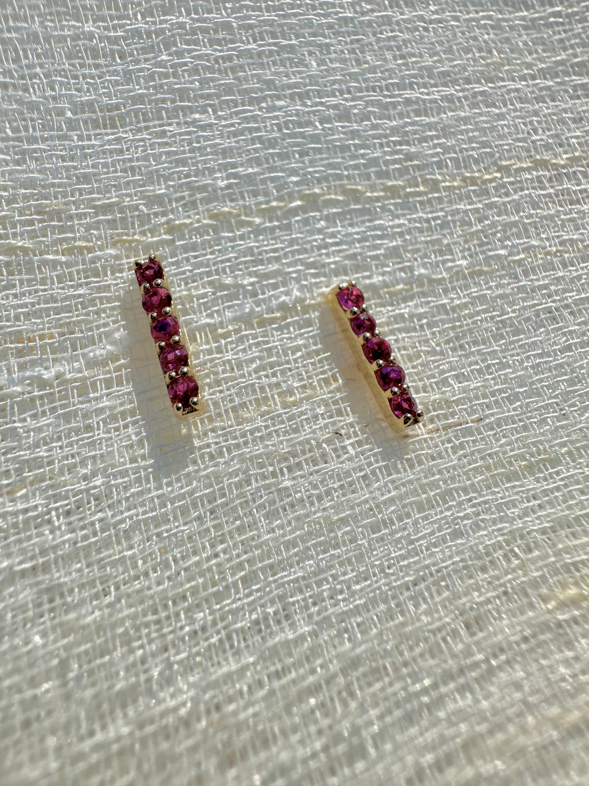 Linear 18K gold bar stud earrings with 1.7mm natural ruby gemstones | Yasmin Nabulsi Fine Jewelry