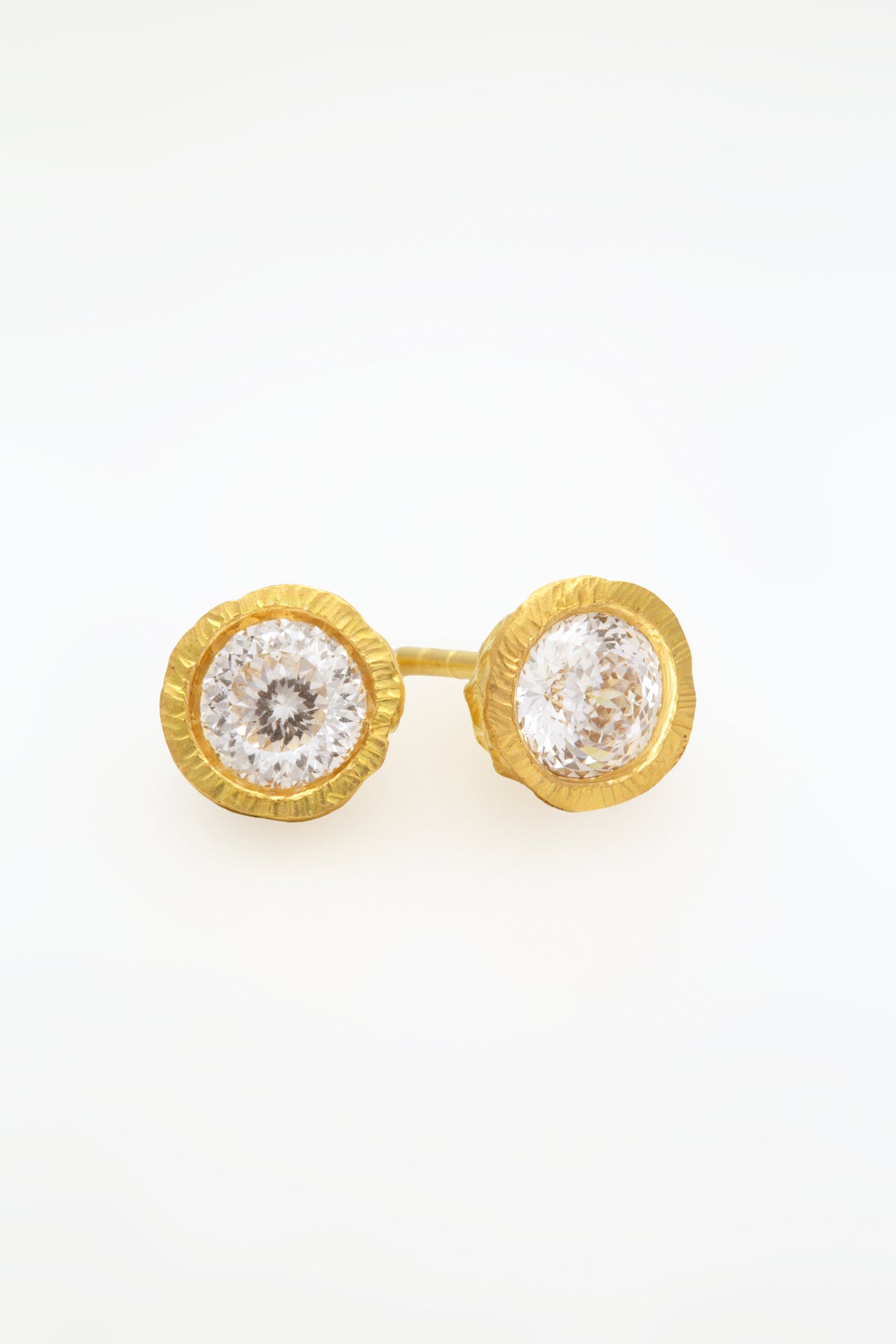 Glypto Diamond Studs, a pair of hand carved gold studs with round diamonds, front view | Yasmin Nabulsi Fine Jewelry