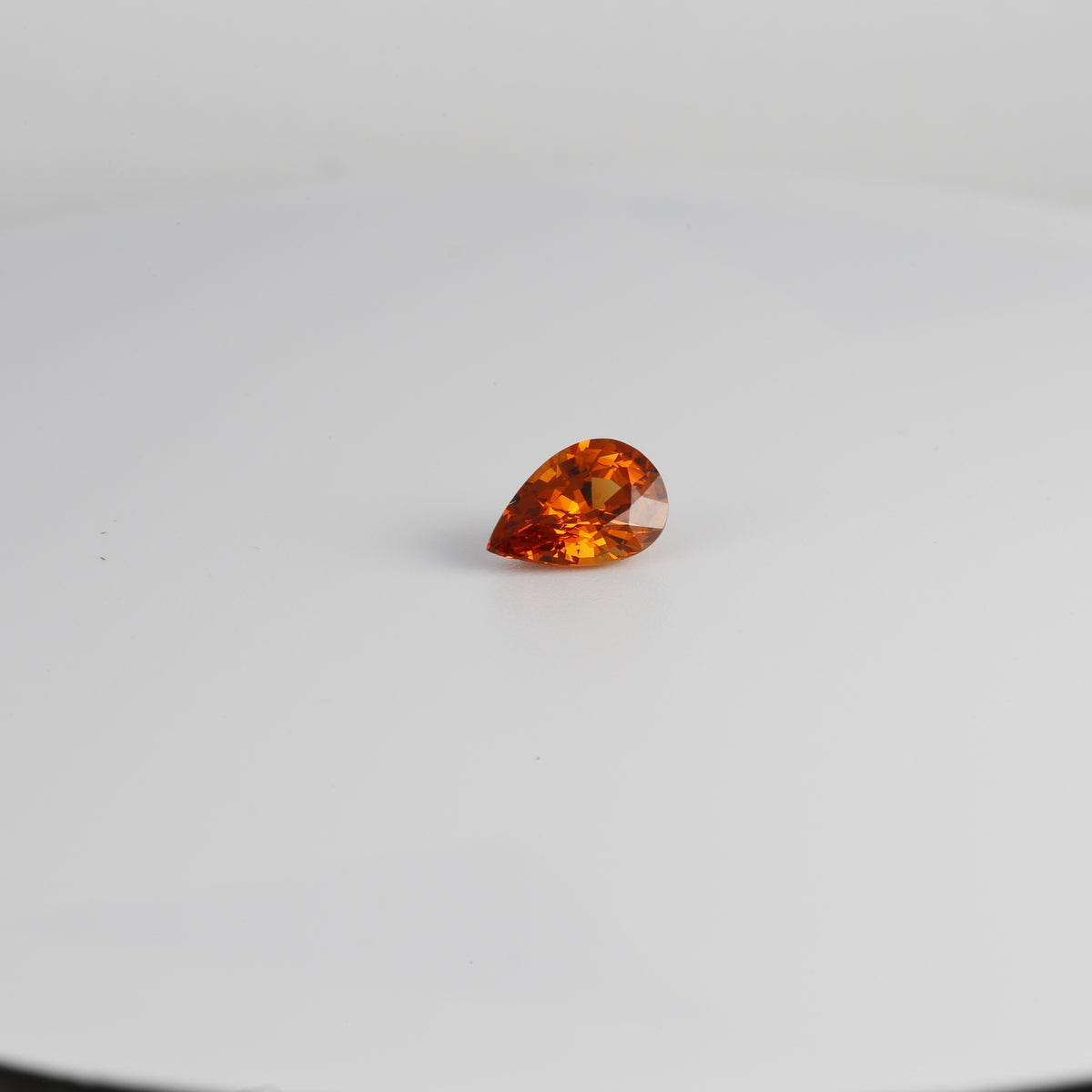 Square format view of the 1.28ct pear shape spessartite garnet