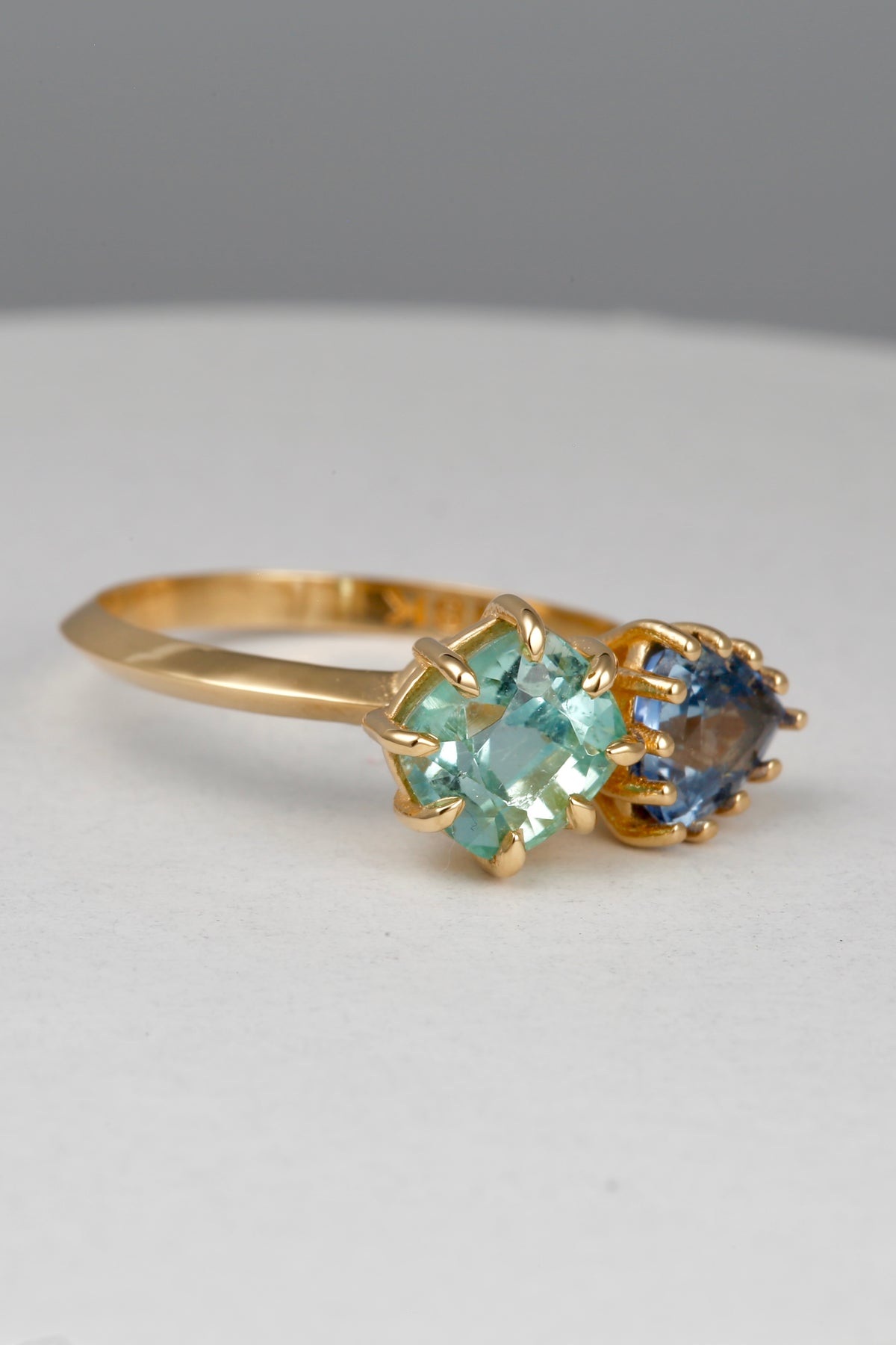 Toi et Moi ring with 1.7ct green tourmaline and 1.11ct blue sapphire in 18K gold