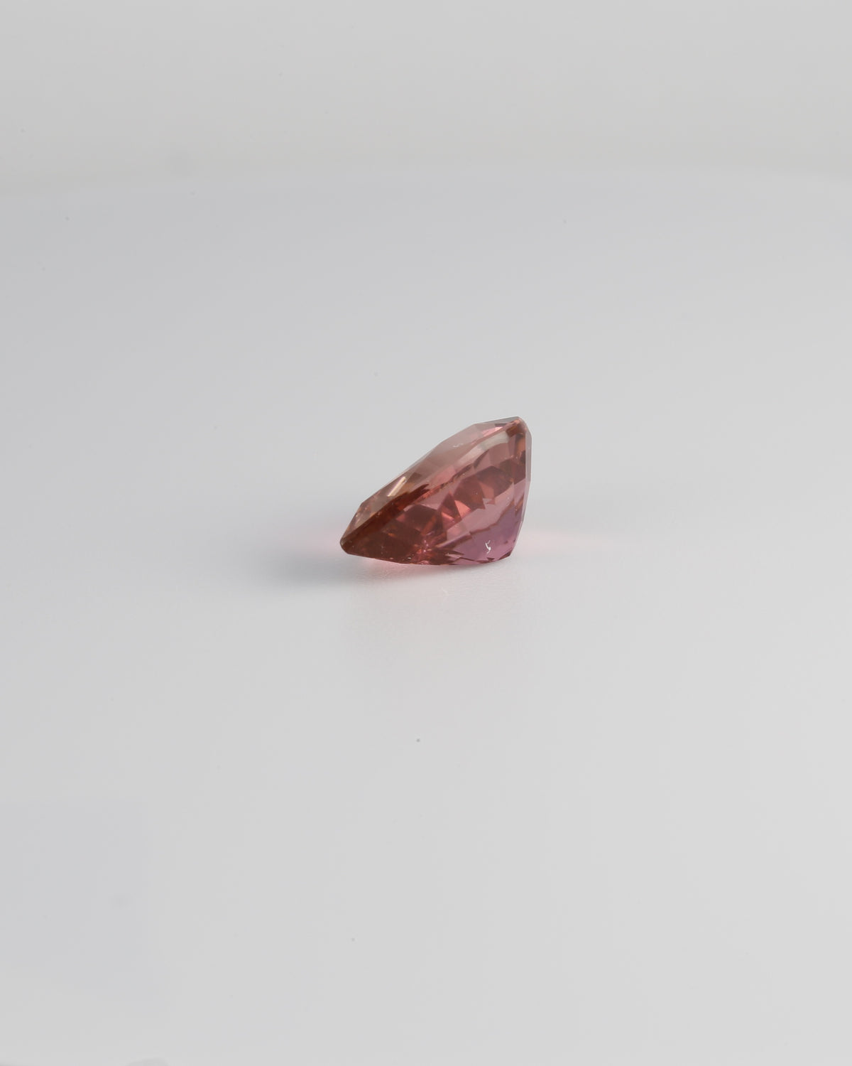 Pear cut pink tourmaline, fifth view, measuring 10.7x7.4mm