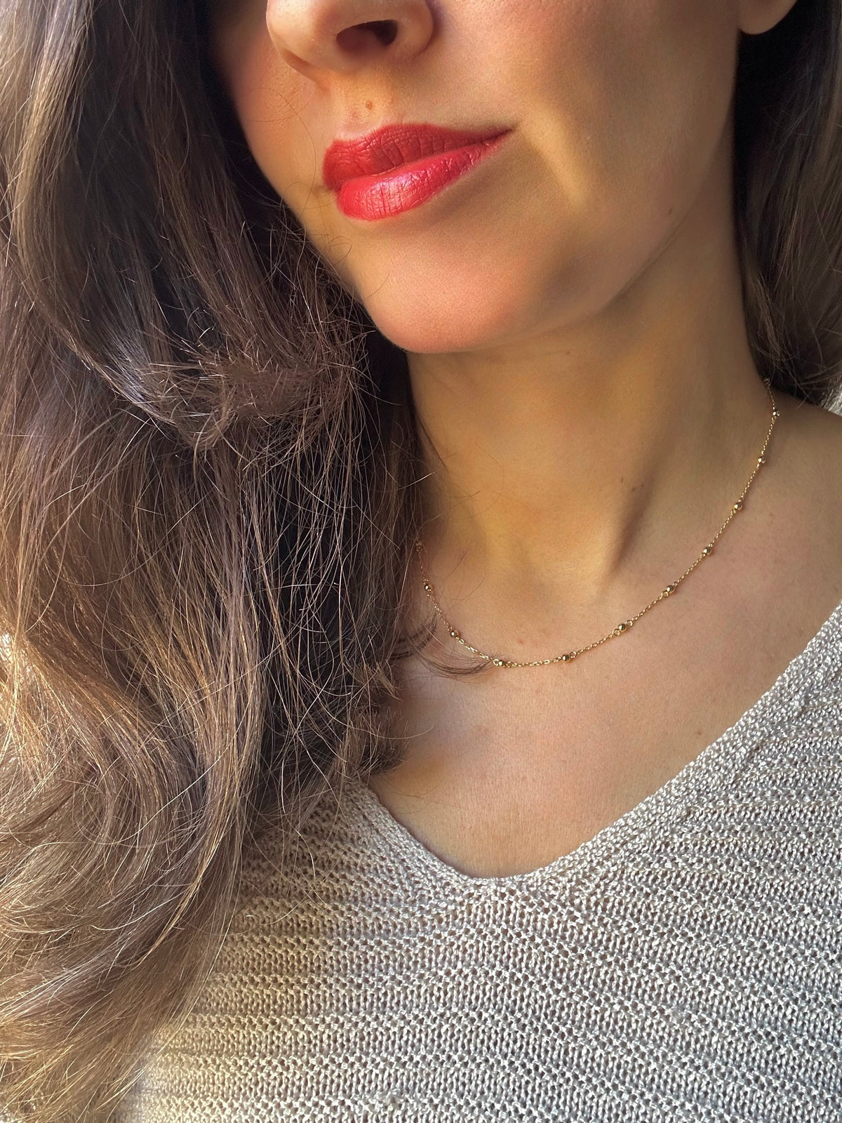 Individually wrapped 2.5mm gold beads on a delicate 18K ball chain