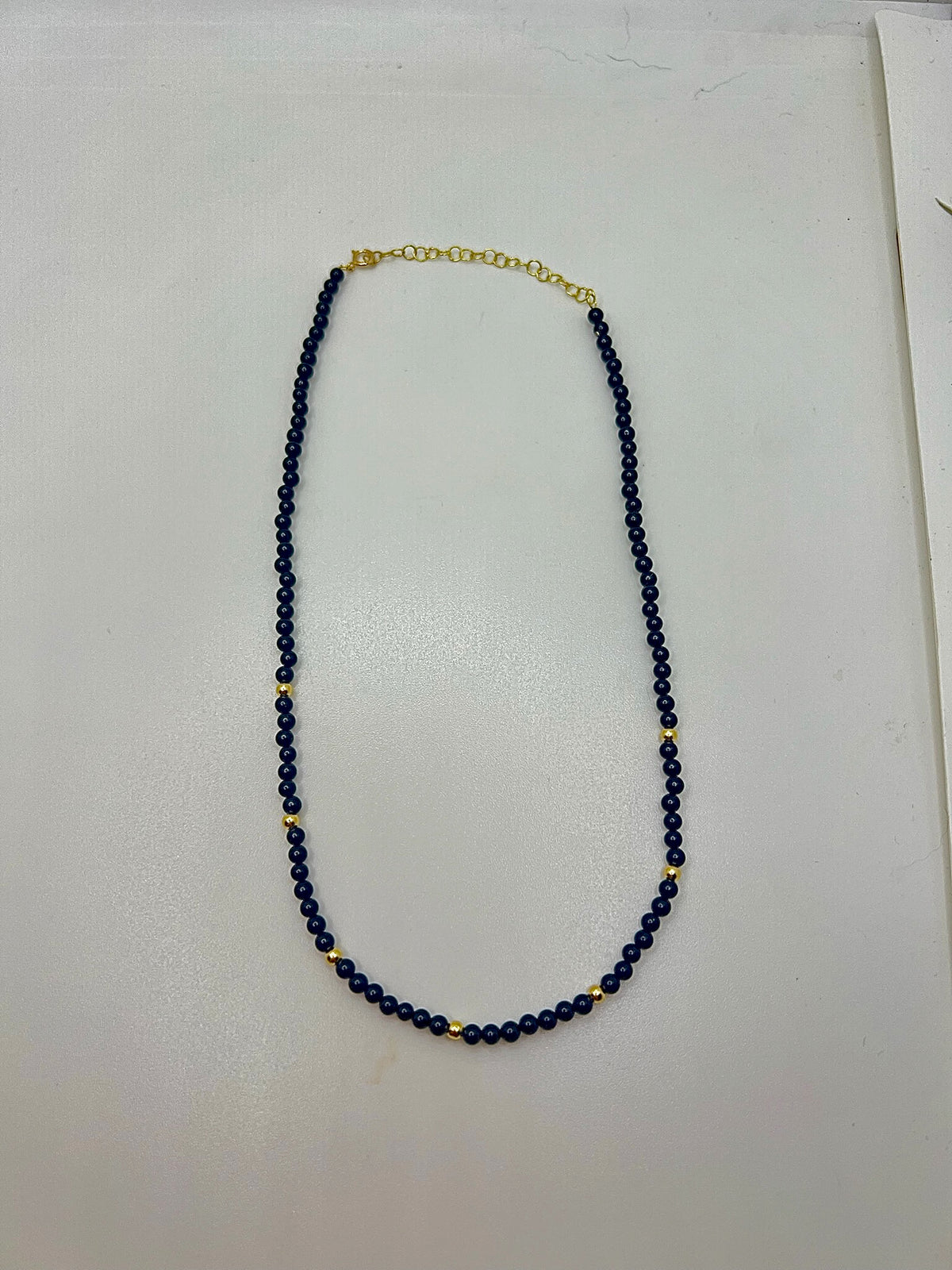 Black onyx necklace with a chain extender for adjustable length
