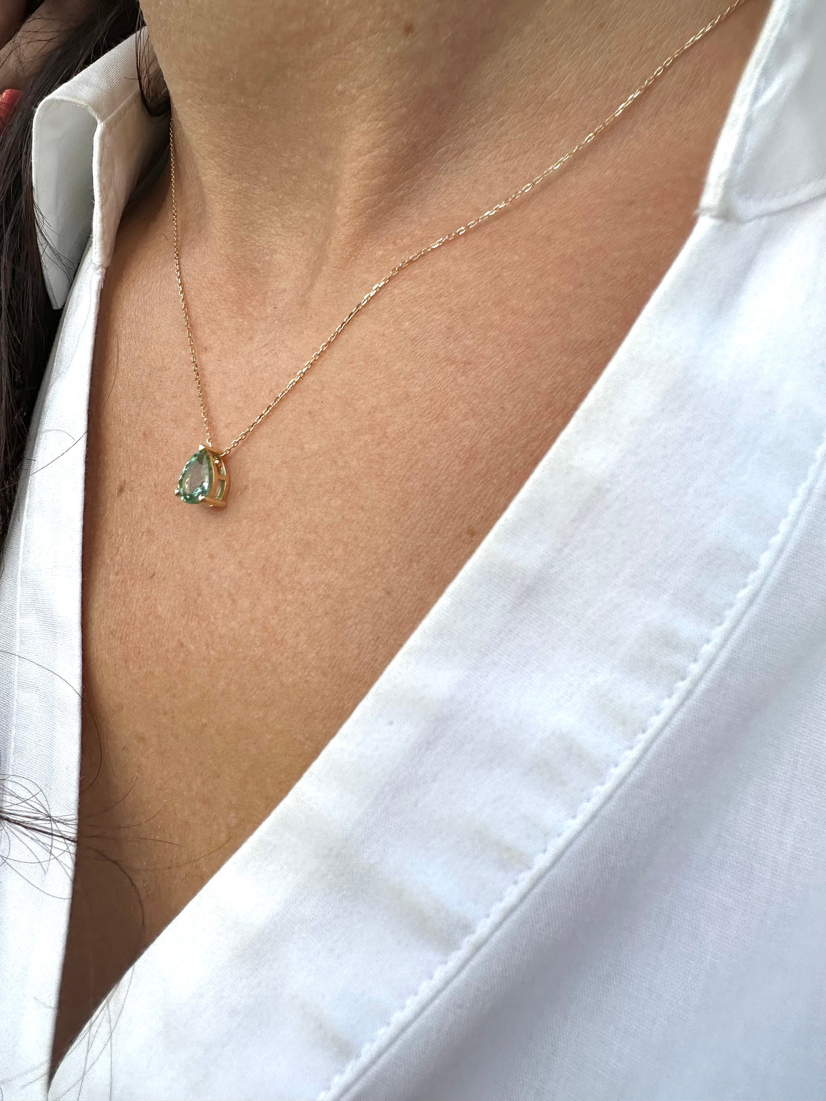 Custom made slide-through tourmaline pendant with a prong setting