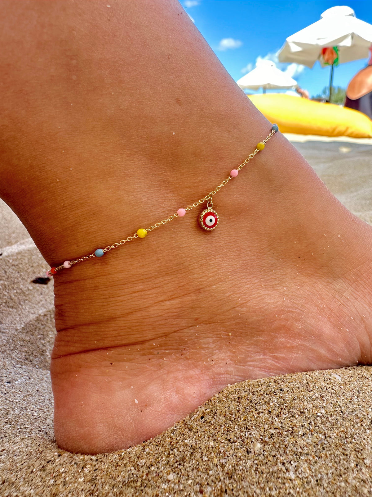 Evil eye anklet in 18K gold with enamel points and an enamel evil eye charm | Yasmin Nabulsi Fine Jewelry