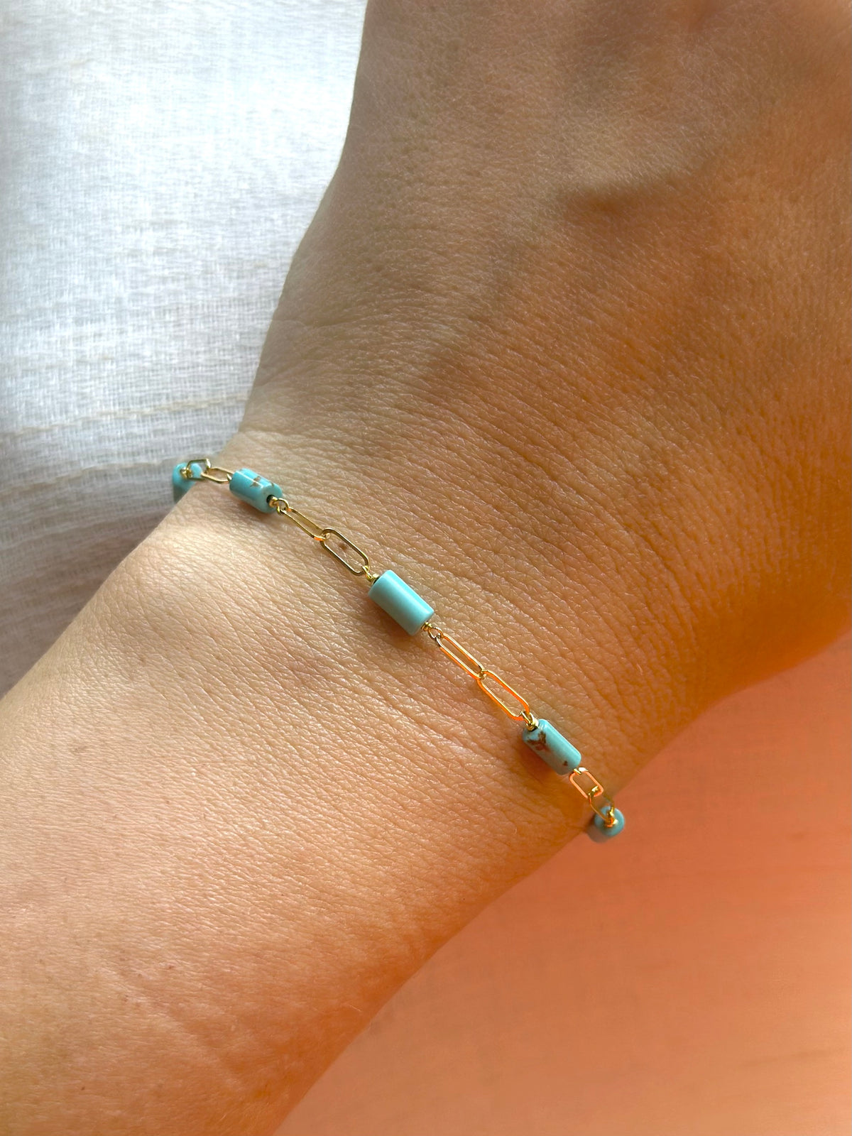 18K gold paperclip bracelet with 7 turquoise tube beads | Yasmin Nabulsi Fine Jewelry