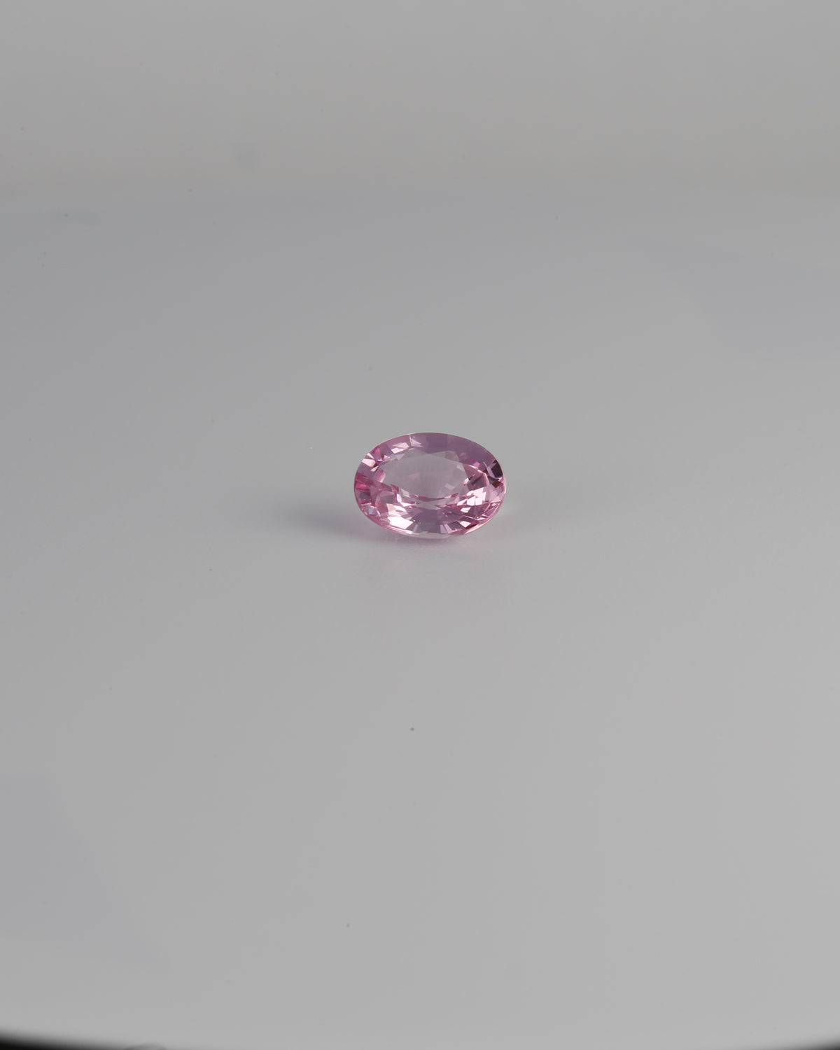Pink spinel 0.80 carat oval gemstone, close product view