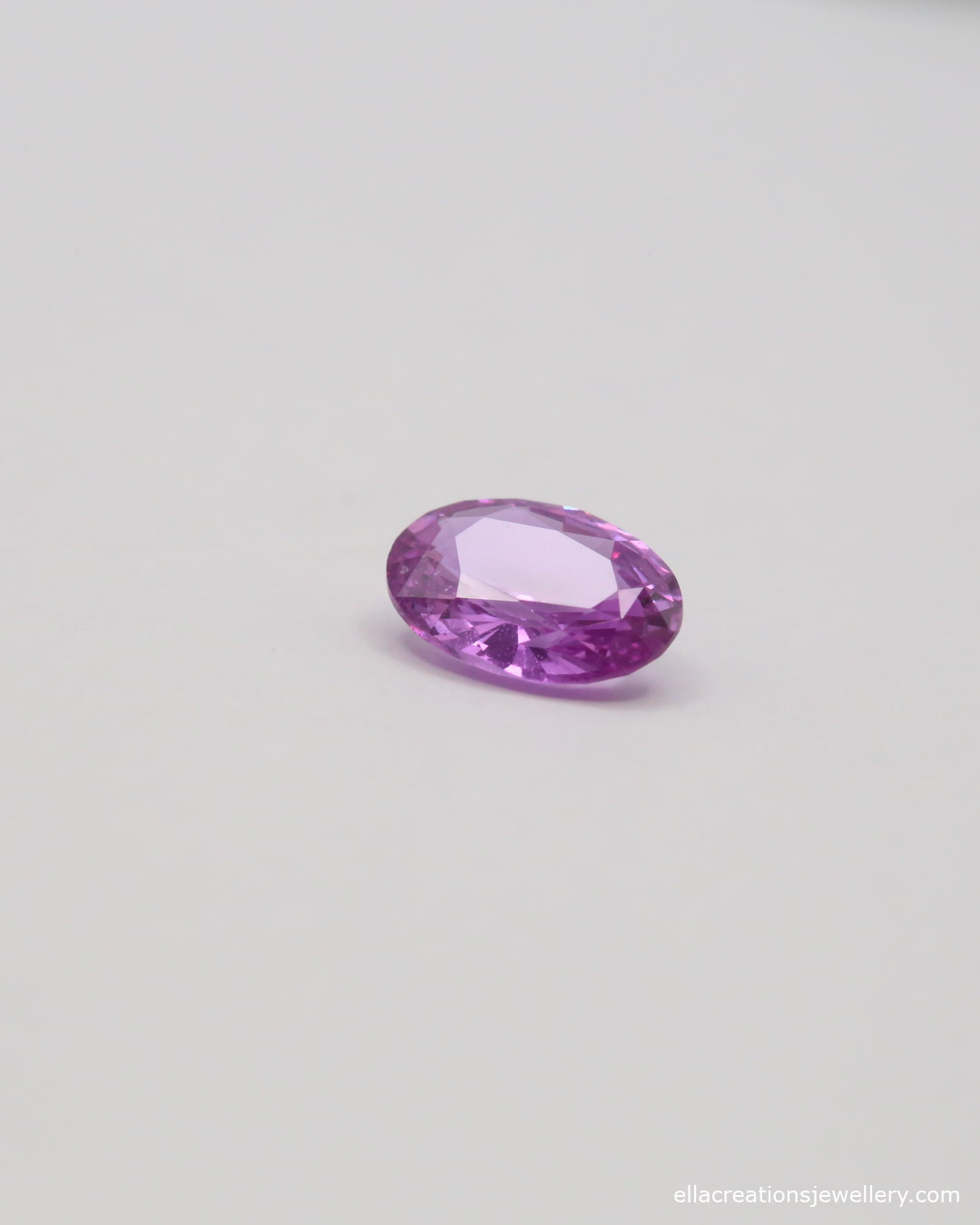 Oval mixed cut pink sapphire, 7.9 x 5.71 x 3.14 mm, heated natural corundum