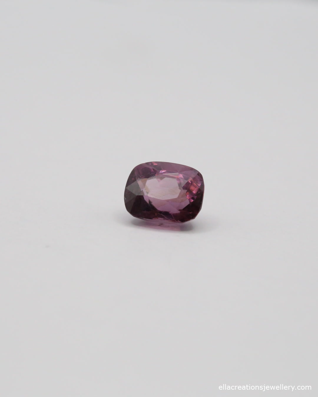 Purple spinel gemstone weighing 1.23 carats, listed as IGI certified