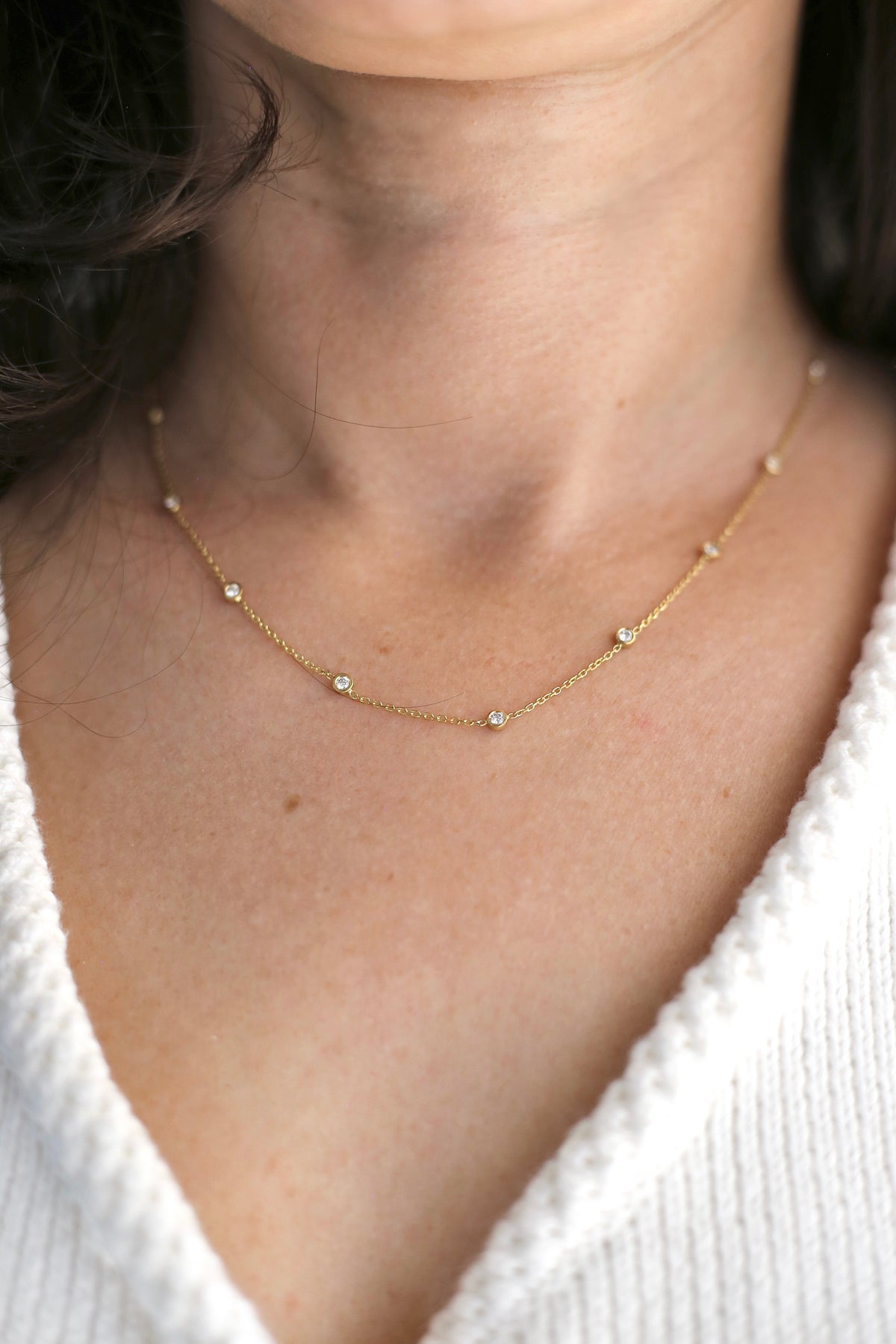 Dainty lab grown diamond necklace in 18K gold, bezel set diamonds