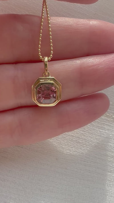 Pink Zircon pendant, set into a custom, two-tiered 18k gold bezel that matches the stone's hexagon shape. | Ella creations Jewelry