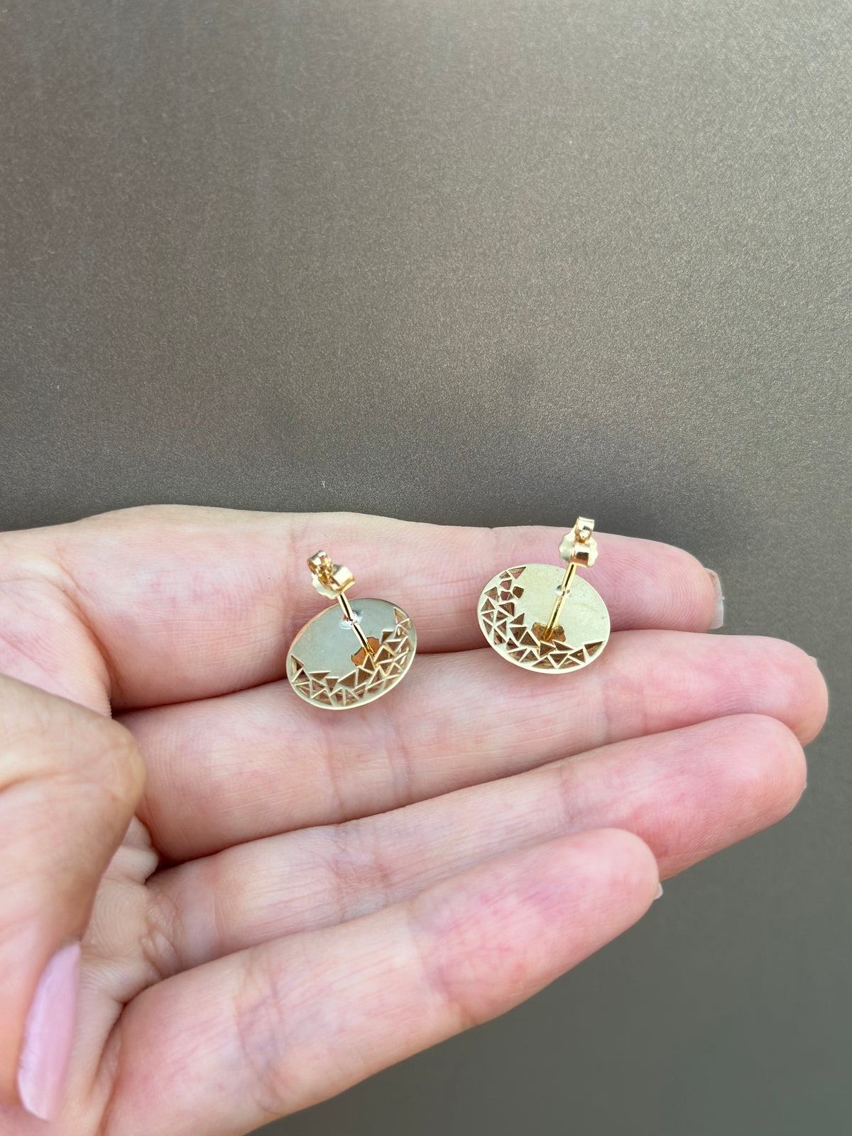 Round domed stud earrings with a flat back, measuring 13 to 14mm
